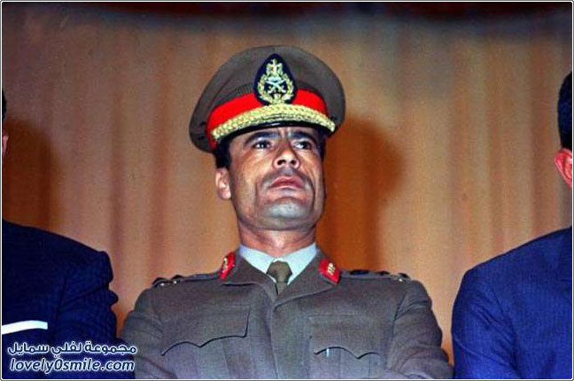 القذافي خلال مسيرة لـأكثر من أربع عقود